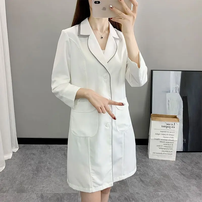 Women Short Spa Uniforms logo  - Medical Lab Logo recension och pris